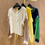 フリンジショルダージャガードスリーブカーディガン